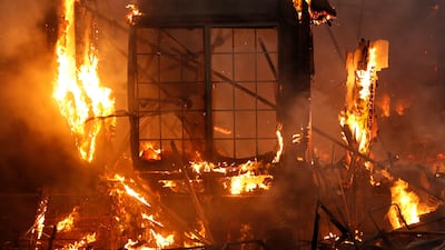 A burning structure is seen at the Hilton Sonoma. Stephen Lam / Reuters