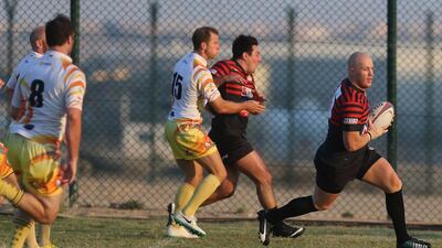 Abu Dhabi Saracens player Matt Hutchings, right, in action against the Dubai Hurricanes on January 23.