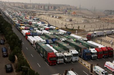 Hundreds of trucks are lined up waiting to cross the border. Reuters