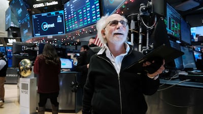 Traders work on the floor of the New York Stock Exchange. The blue-chip S&P 500 index recently closed at a record high after a rise in US inflation fell short of the market’s worst-case forecasts. AFP