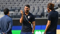 The Iran squad walk around the pitch in Los Angeles on the eve of their World Cup opener against New Zealand. AFP