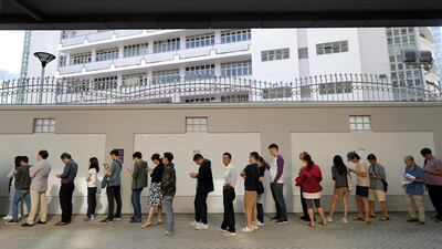 Long lines formed outside Hong Kong polling stations. AP Photo