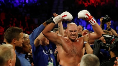 Tyson Fury celebrates winning the fight. REUTERS