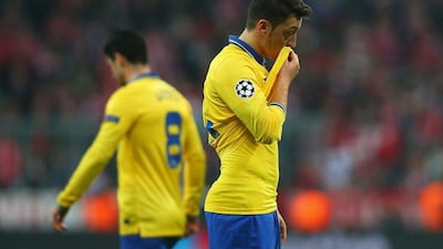 Mesut Ozil injured his hamstring against Bayern Munich on Tuesday night. Alexander Hassenstein / Bongarts / Getty Images / March 11, 2014