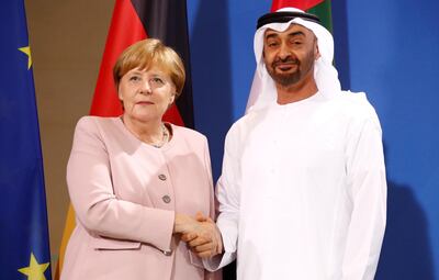 Angela Merkel and Sheikh Mohamed bin Zayed shake hands at the Chancellery in Berlin, Germany, June 12, 2019. Reuters