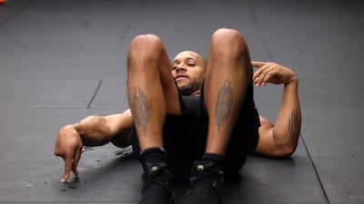 Ciryl Gane jokes with training partners and coaches at Tripl3 MMA, Dubai.