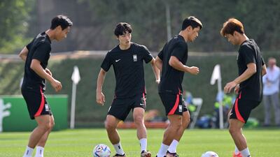 Cho Gue-sung trains with his South Korea teammates in Doha. AFP