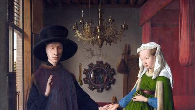 'The Arnolfini Portrait' by Jan van Eyck features the artist's personal tag in the background on the wall. Getty Images