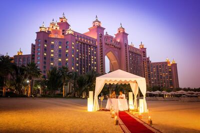 Those looking to go all out this Valentine’s Day can book a candlelit cabana and dine under the stars at Atlantis The Palm’s Royal Beach. Courtesy of Atlantis The Palm