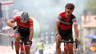 Swiss BMC rider Silvan Dillier, right, celebrates as he crosses the finish line ahead Belgian rival Jasper Stuyven of team Trek to win the 6th stage of the 100th Giro d'Italia, Tour of Italy, cycling race from Reggio di Calabria to Terme Luigiane on May 11, 2017. Luk Benies / AFP