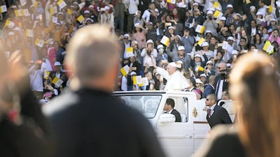 Pope Francis greets the worshippers. Reem Mohammed / The National