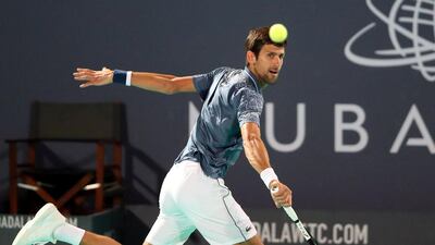 Novak Djokovic returns a shot against Karen Khachanov during their Mubadala World Tennis Championship match at Zayed Sports City. Reuters