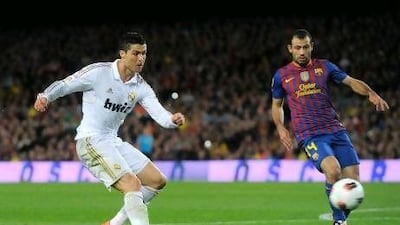 Cristiano Ronaldo, left, scored the winner to lift Real Madrid over their Primera Liga rivals, Barcelona.