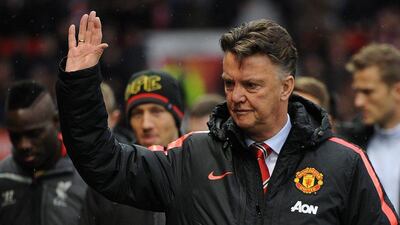 Manchester United manager Louis van Gaal reacts during his side's 3-0 victory against Liverpool in the Premier League at Old Trafford on Sunday. Peter Powell / EPA / December 14, 2014