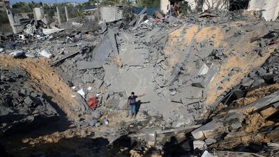 A crater from an Israeli air strike in Al Qarara, Gaza Strip, before a ceasefire took effect on November 14, 2019. AP Photo