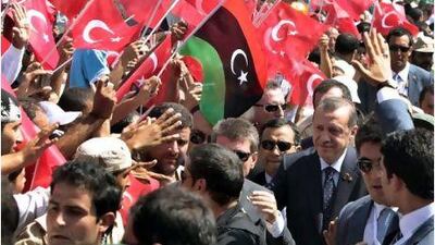 The Turkish prime minister Recep Tayyip Erdogan visiting Libya on Friday. He also attended a rally at Martyrs' Square in Tripoli. Suhaib Salem / Reuters