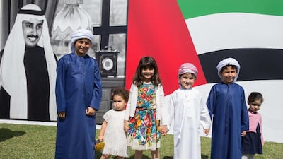 The grandchildren of the late Khalifa Al Mubarak stand for a photograph during a street renaming ceremony in his honor. From left Mustafa, Lulwa, Sarya, Khalifa, Khaled and Alyazia. Silvia Razgova / Crown Prince Court - Abu Dhabi