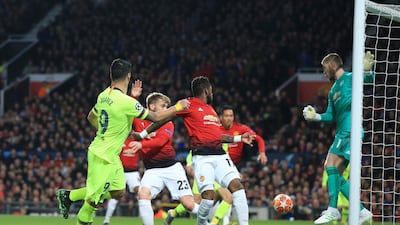 Barcelona's Luis Suarez, left, heads towards goal to create the only goal of the game. AP Photo