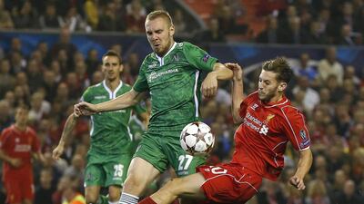 Liverpool's Adam Lallana, right. Reuters