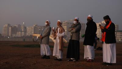 Senior Muslim clerics observes the skies over Cape Town, South Africa. AP Photo
