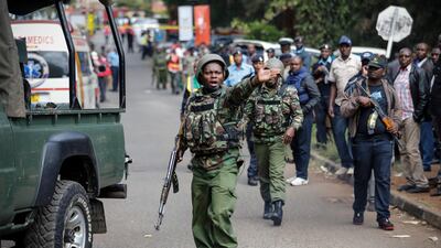 A Kenyan police officer outside the business complex in Nairobi, Kenya, that was stormed by by Al Shabab. Dai Kurokawa / EPA