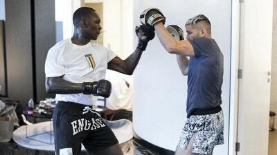 UFC middleweight champion Israel Adesanya training in his hotel room in Abu Dhabi ahead of his title defence against Paulo Costa at UFC 253, which opens Fight Island 2 in the capital on Sept 27. Credit: Jeff Sainlar - EMG