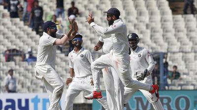 India's captain Virat Kohli (2nd R) celebrates with his teammates after the dismissal of New Zealand's Ross Taylor. Rupak De Chowdhuri / Reuters