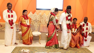 The couple complete traditional ceremonies to cement their vows