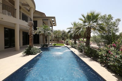 The exterior of a villa in Sanctuary Falls at Jumeirah Golf Estates in Dubai. Pawan Singh / The National