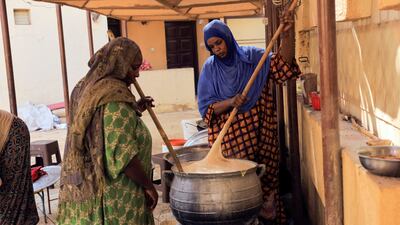 Youth volunteers prepare donated food in Khartoum, Sudan. Reuters