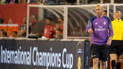 Real Madrid manager Zidane Zinedine shouts instructions to his players during the International Champions Cup match betweeen FC Bayern Munich and Real Madrid CF August 3, 2016 at MetLife stadium in East Rutherford, NJ. Don Emmert / AFP