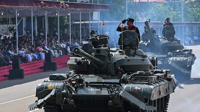 Sri Lanka army tanks roll along the sea-front promenade in Colombo. AFP