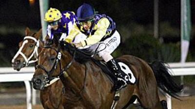 The spirited Sahib Du Clos, left, was the success story in Abu Dhabi last night.