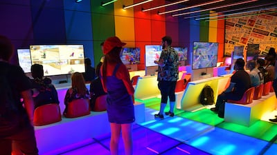 Gamers play video games during the Game XP event at the Olympic Park in Rio de Janeiro, Brazil. AFP
