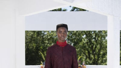 Woven leather is made into a boxy jacket and beautifully haphazard wrapped skirt. Courtesy Qasimi