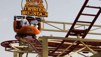 Visitors enjoy the new Twister Mountain ride at Hili Fun City in Al Ain.