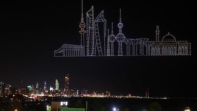 Kuwait City's skyline hovers above the city in this drone image