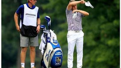 Luke Donald, right, struggled with the weather last week and will come prepared in Atlanta.