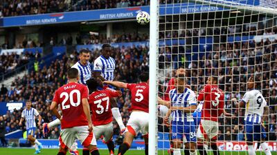 Brighton & Hove Albion's Danny Welbeck heads at goal. Action Images
