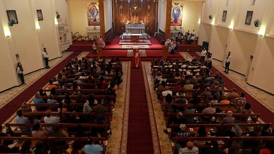 Iraqi Christians attend the Palm Sunday service at Mar Youssif Church in Baghdad, Iraq, Sunday, April 14, 2019. AP