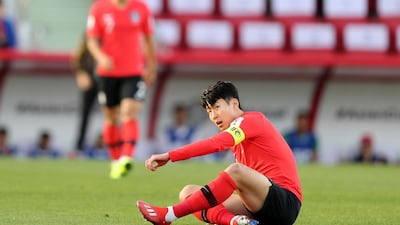 Son Heung-min of South Korea lies down after a tackle in the game between South Korea and Bahrain in the Asian Cup 2019. Tuesday, January 22nd, 2019 at Rashid Stadium, Dubai.