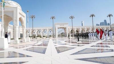Sheikh Mohamed bin Zayed, Crown Prince of Abu Dhabi and Deputy Supreme Commander of the UAE Armed Forces and Jair Bolsonaro, President of Brazil, stand for the national anthem during an official reception at Qasr Al Watan. Ministry of Presidential Affairs
