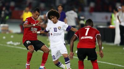 Omar Abdulrahman, centre, continues to say he his happy at Al Ain, but he also still harbours dreams of playing in Europe. Pawan Singh / The National