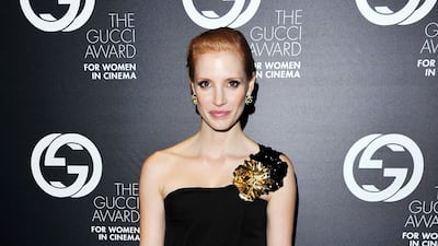 Jessica Chastain, in a black Gucci gown with gold detailling, attends the 2011 Gucci Award For Women In Cinema at Hotel Cipriani on September 2, 2011 in Venice, Italy. Getty Images