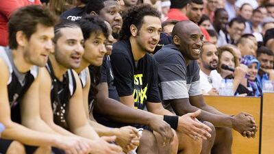 Kobe Bryant is all smiles as his team win at The American University in Dubai's Knights Arena. Duncan Chard for The National