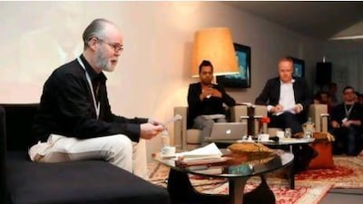 Douglas Coupland on stage at last month's Global Art Forum in Dubai, together with Shumon Basar and Hans-Ulrich Obrist. Courtesy of Art Dubai
