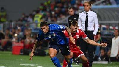 Italy defender Giovanni Di Lorenzo is challenged by Lithuania's Donatas Kazlauskas. AFP