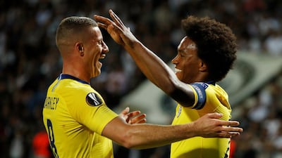 Chelsea's Willian celebrates scoring their first goal with Ross Barkley. Action Images