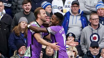 Harry Kane, left, celebrates scoring with teammate Ryan Sessegnon. AP