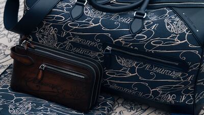 Accessories have been adorned with Berluti's Scritto motif. Photo: Berluti